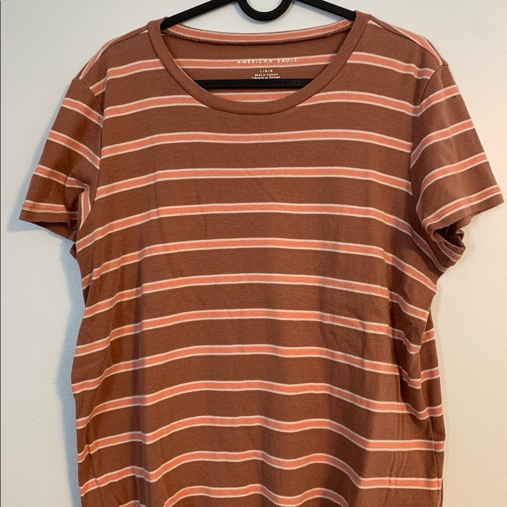 plain orange and pink stripped shirt from American Eagle. It is a size large